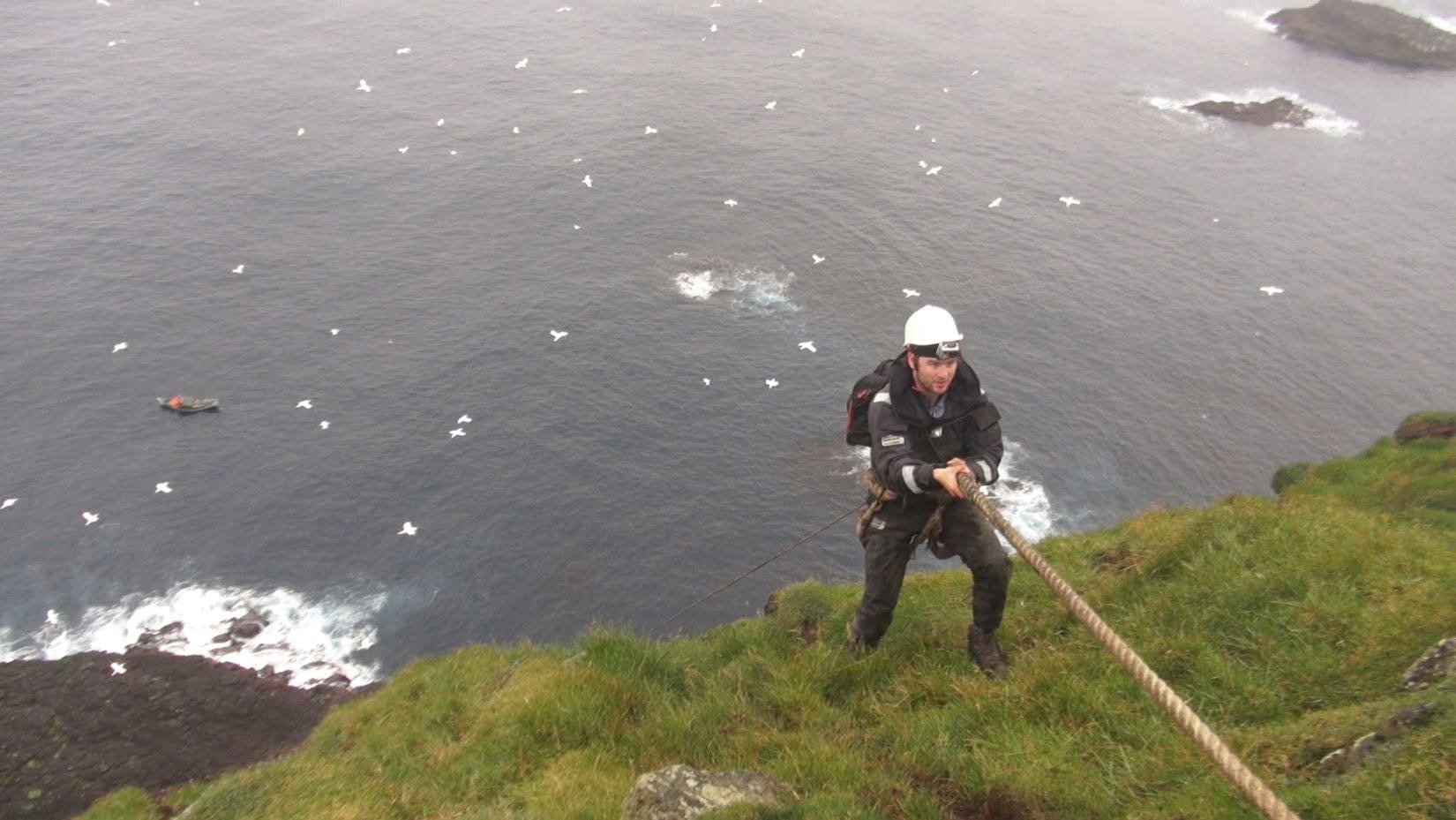 Rappelling the cliffs
